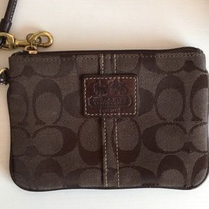 Brown coach wristlet barely touched